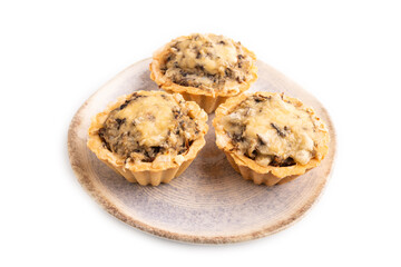 Tartlets with meat and cheese isolated on white. side view, copy space