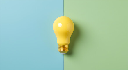 Yellow Lightbulb Centered on Light Blue and Green Split Background Representing Innovation
