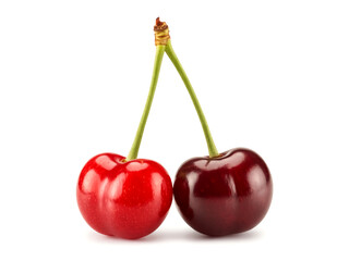 A pair of red cherries with stems isolated on white background glossy finish crisp lighting