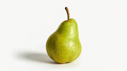 A single green pear on a white background isolated with soft shadows high resolution product photography