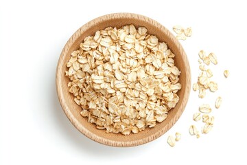 Rolled oats in wooden bowl on white background