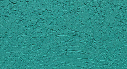 Fototapeta premium Teal Textured Surface: Close-Up of Rough Stucco-Like Finish