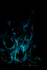 Blue Flame Dance on Black Background with Ethereal Light Glow
