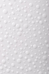 Close up water drops on white background. Top view.