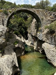 old stone bridge in the mountains