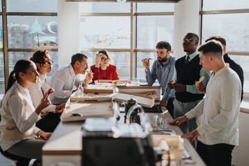 A diverse group of business employees gathers around a table enjoying pizza during a casual lunch break, fostering teamwork and collaboration in a modern office environment.