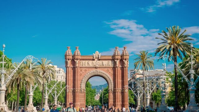 Hyperlapse of Arc de Triomf, tourist landmark in Barcelona on sunny day. Timelapse with tourists in Spain in summer season