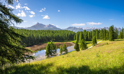 Queyras Nature Park with Lac de Roue lake in summer. GR58 hiking trail in Hautes-Alpes. French...