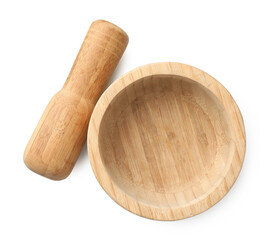 Wooden mortar with pestle isolated on white, top view