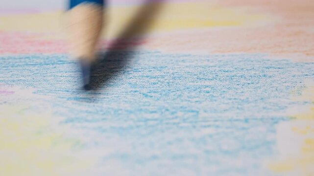 Vibrant Colored Pencils Creating Artistic Drawings in a Creative Office Setting
