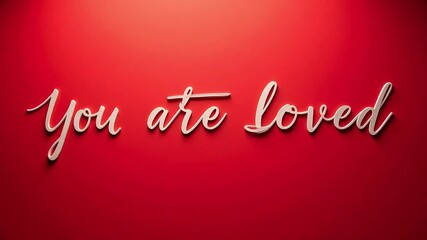 Inspirational words You are Loved on a red background perfect for Valentines Day cards social media posts or wall art design projects