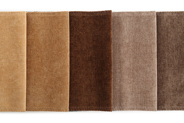 Samples of different fabrics isolated on white, top view