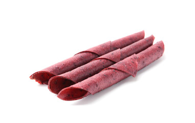 Delicious fruit leather rolls on white background