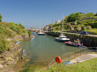 Amlwch Anglesey. A Welsh sea port with several boats docked at the pier