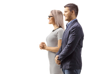 Young man and woman standing and waiting