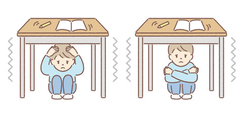 地震時に机の下に隠れる子ども（男の子）