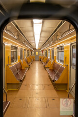 Obraz premium A five-car metro train operated by the Prague Public Transport Company in the metro network, which is the backbone of public urban transport in the capital of the Czech Republic.