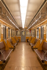 Fototapeta premium A five-car metro train operated by the Prague Public Transport Company in the metro network, which is the backbone of public urban transport in the capital of the Czech Republic.