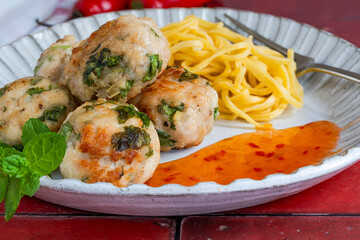 Thai-style turkey meatballs with sweet chilli sauce and egg noodles