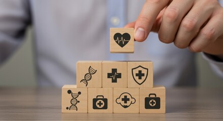 Person arranging wooden blocks symbolizing health and medical care