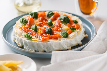 Omelette Poulard. Omelette of Mother Poulard. French omelette with whipped egg whites, lightly salted trout and basil. Beautiful, healthy and tasty breakfast.