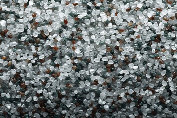 Close-up texture displaying small rocks in shades of clear white and dark gray
