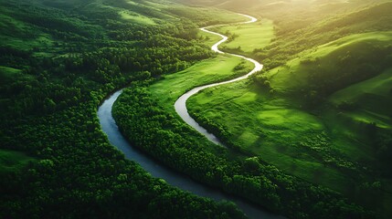 Serpentine river winding through lush green hills.