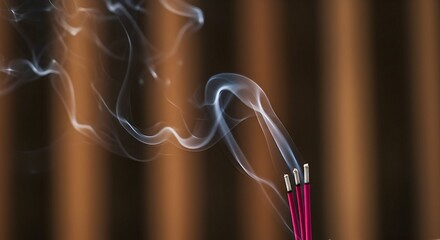 Incense Sticks Burning with Smoke Against Brown Background