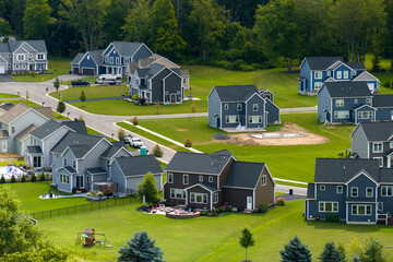 American dream homes as example of real estate development in US suburbs. View from above of...
