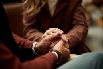 Obraz premium Close-Up of People Holding Hands to Show Comfort and Support