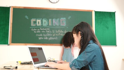 Girl writing engineering prompt by using AI software or programing system to generate AI on table...