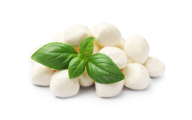 Tasty mozzarella cheese balls and basil isolated on white