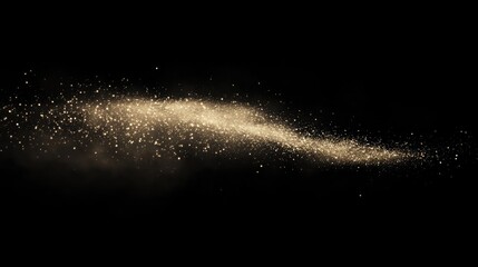 Golden glitter trail on a dark background for festive design element