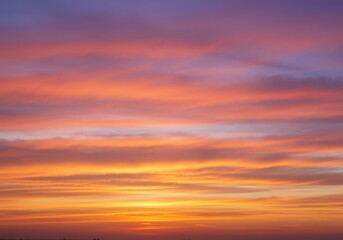 Obraz premium Serene Sunset Sky with Colorful Cloudscape - Peaceful sunset, vibrant colors, soft hues, tranquil atmosphere, hope and serenity. Captures the beauty of nature's artistry