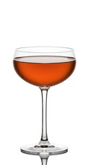A glass of amber liquid on a white background display