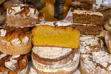 traditional Galician freshly bread for sale at a street market during a festive event