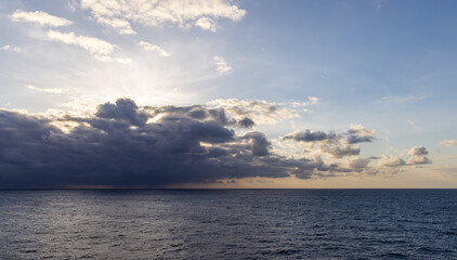 Dramatic Cloudscape Over Pacific Ocean at Dusk with Calm Cloudy Sky