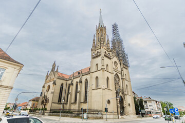 Exterior view of the grand Gothic architecture of Saint Gerard’s Catholic Church in Vršac,...