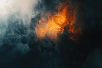 Abstract dark clouds with fiery orange center, creating a dramatic, moody atmosphere.