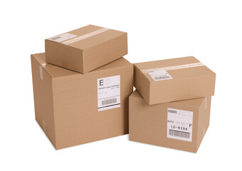 Fototapeta premium Many parcels with shipment labels isolated on white