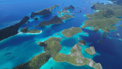 Remote lagoon at Wayag island consisting of limestone islands, Raja Ampat, West Papua, Indonesia