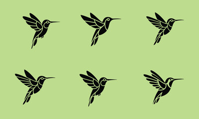 Six silhouettes of hummingbirds in flight