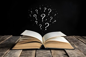 Open Blank Book with Floating Question Marks on Wooden Table – Conceptual Dark Background Image