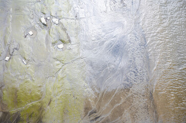Mud and water at the banks of the river Scheldt in Weert, Antwerp, Belgium