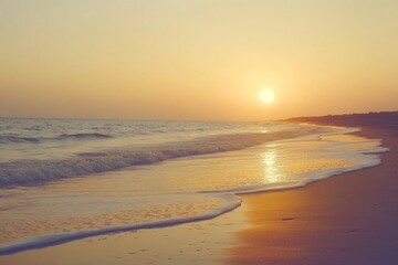 Scenic beach view at sunset with vibrant colors and calm waves reflecting the sky