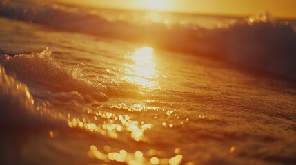 Obraz premium Close up of a wave crashing on the shoreline of an ocean during daylight