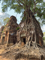 Prasat Pram Temple at Koh Ker – Towers Entwined by Tree Roots..
