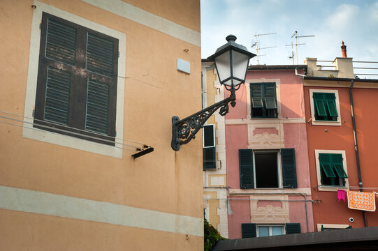 Fototapeta colorful houses with lanterns and shuttered windows on the streets of Nervi, Liguria, Genoa, Italy, Europe