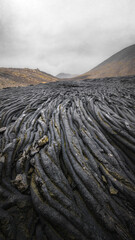 Fresh lava on the Reykjanes Peninsula, Iceland, forms rope-like, spaghetti patterns, illustrating...