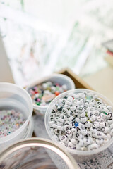Colorful beads and letter beads for sensory play and montessori activities